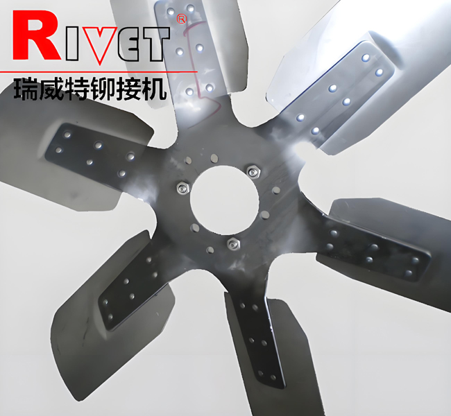 Riveting machine processed fan blades